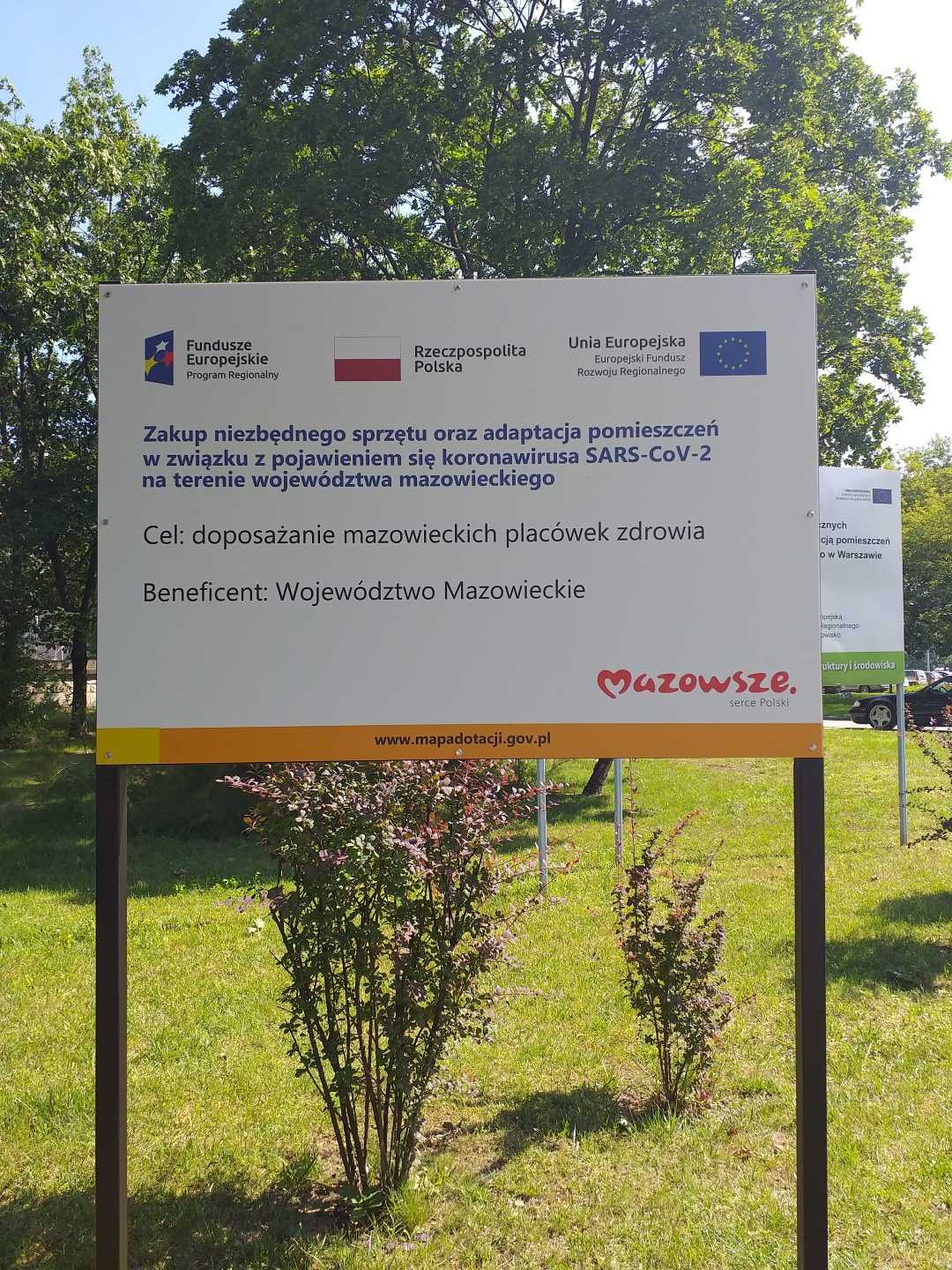 Tablica dotacyjna na terenie WIM.